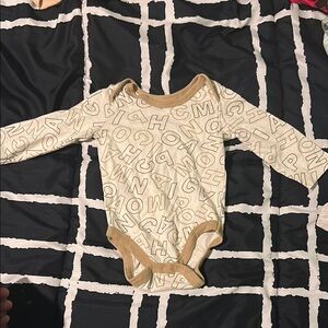 Champion Cream and Tan Bodysuit with Lace Pattern